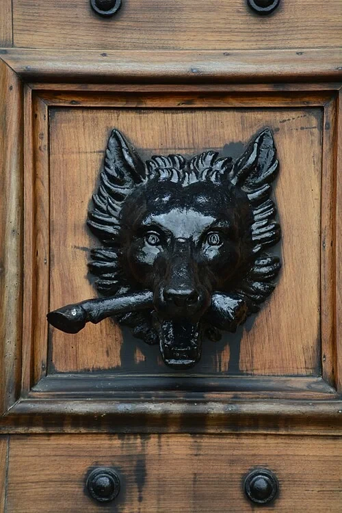 The Wolf-Head Knocker