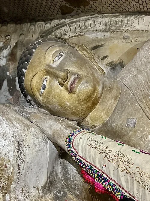 The Reclining Buddha's Face — Dambulla cave temple audio guide stop
