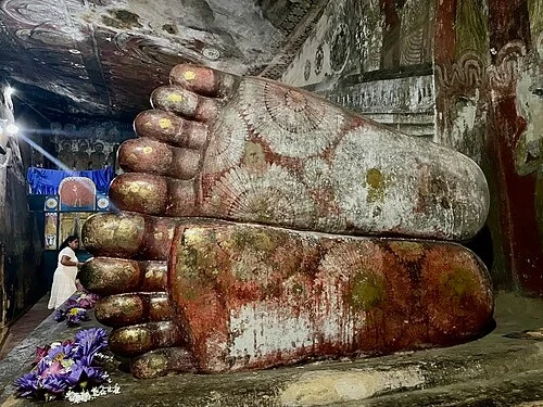 The Painted Soles of the Buddha — Dambulla cave temple audio guide stop